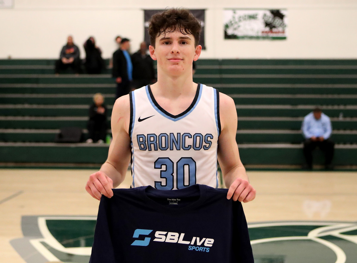 Connor Admunsen accepts Player of the Game award. 